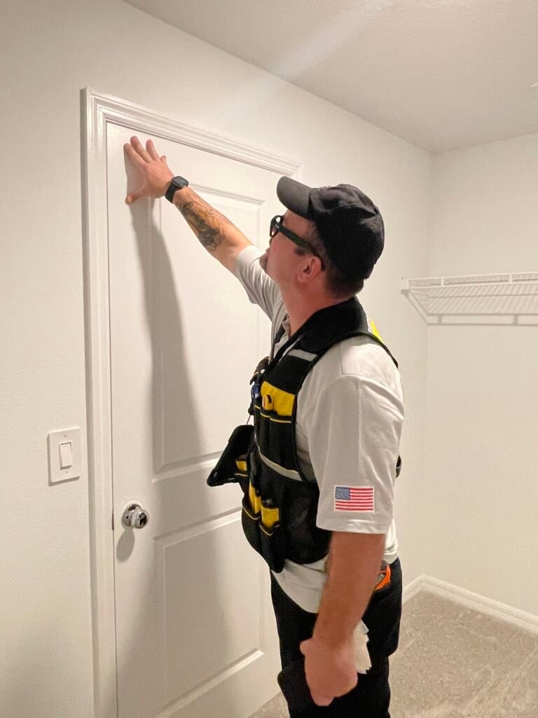 Rob checking the door frames during a home inspection in riverview fl